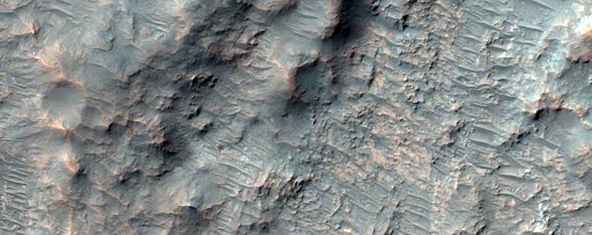 Compositionally Distinctive Ejecta Block from Saheki Crater