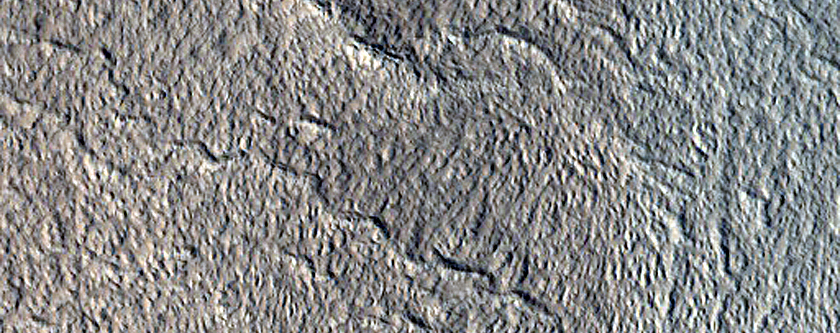 North-Pole-Facing Deposit in Crater Associated with Headwall Erosion