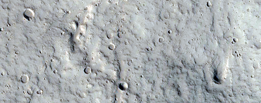 North-Pole-Facing Deposit in Crater Associated with Headwall Erosion