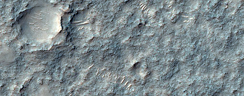 Flows and Bedrock in Sinai Planum