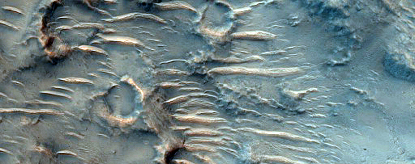 Phyllosilicates Exposed by Impact Crater in Tyrrhena Terra