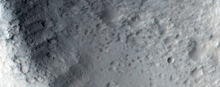 Possible Corinto Crater Related Flow Interactions with Pre-Existing Crater