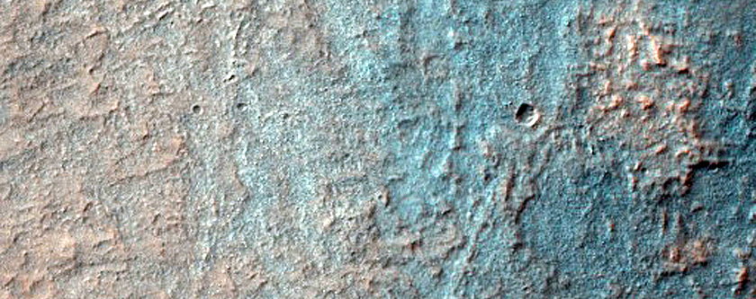 Hydrated Materials in West Hellas Planitia