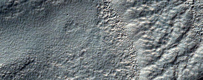 Layered Deposits in Crater in Nereidum Montes