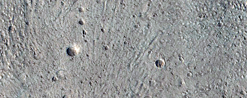 North-Pole Facing Deposit in Crater Associated with Headwall Erosion