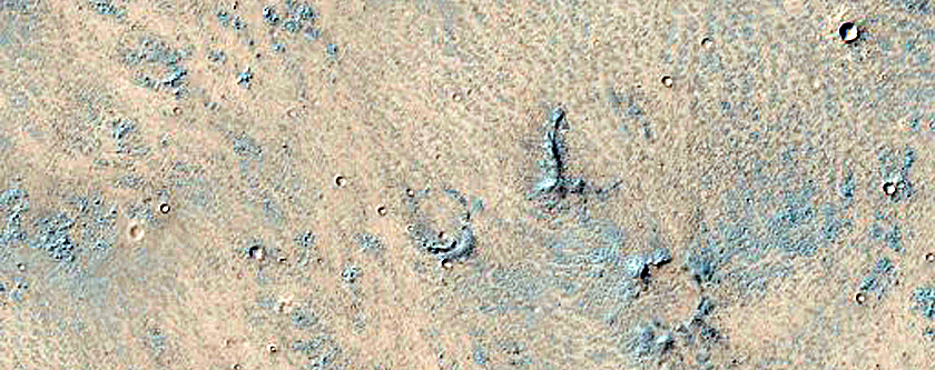 Bright Substrate Exposed by Small Craters in Syria Planum