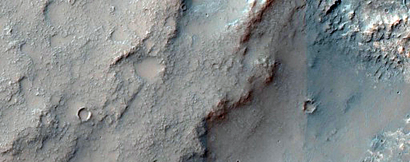 Layered Bedrock and Bedforms in Flaugergues Crater