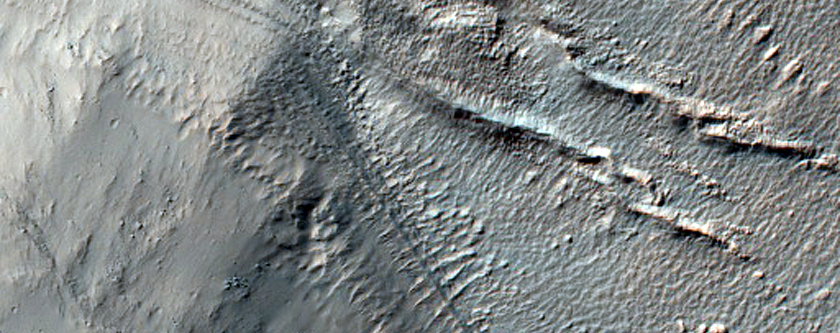Channel Across Crater Rim in Noachis Terra