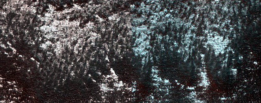 Persistent Northern Plains Ice Deposit Monitoring in Heimdal Crater
