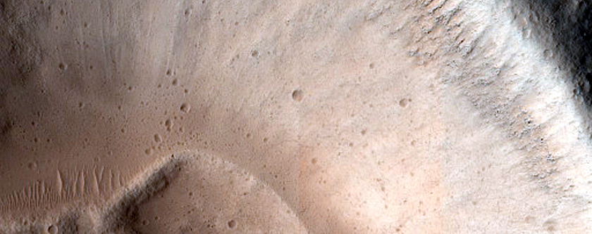 North-Pole-Facing Deposit in Crater Associated with Headwall Erosion