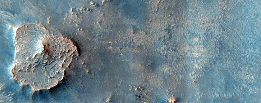Possible Erosional Remnants of Jezero Crater Ejecta