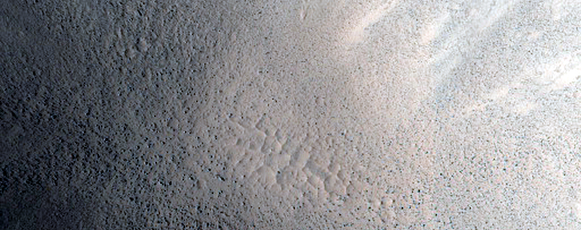 North-Pole-Facing Deposit in Crater Associated with Headwall Erosion