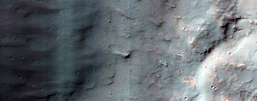 Possible Olivine-Rich Materials on Western Wall of Halba Crater
