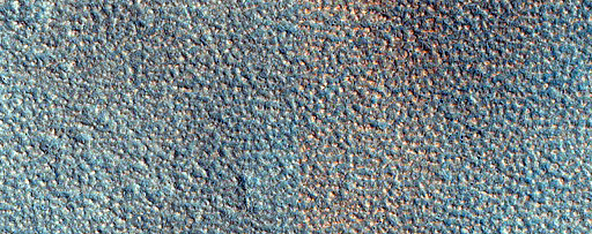 Edge of Ejecta from Olivine-Rich Crater