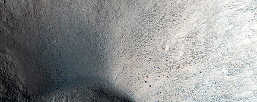 North-Pole-Facing Deposit in Crater Associated with Headwall Erosion