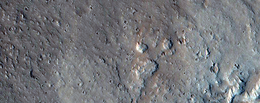 North-Pole-Facing Deposit in Crater Associated with Headwall Erosion