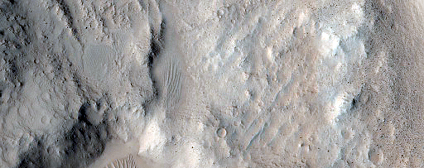 North-Pole-Facing Deposit in Crater Associated with Headwall Erosion