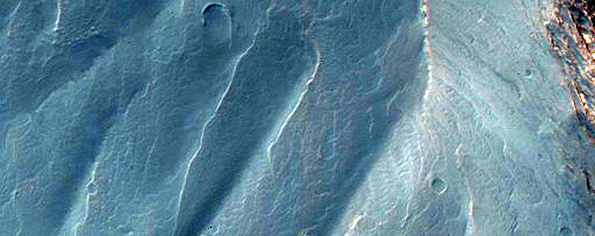 Dark Spot in Crater