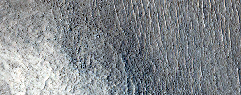 Layered Deposit in Crater in Northern Plains