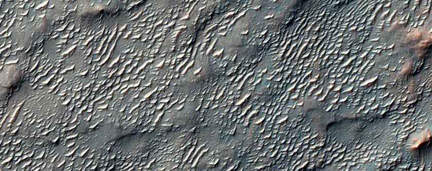 Pyroxene-Rich Crater Ejecta in Terra Sabaea