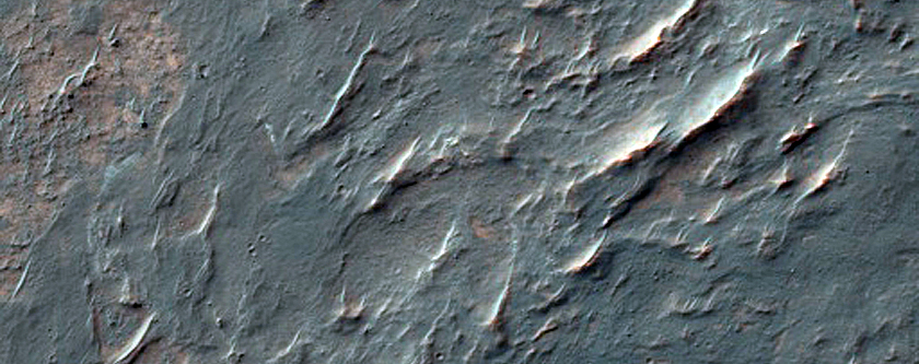 Phyllosilicates in Crater Ejecta in Southern Thaumasia Planum