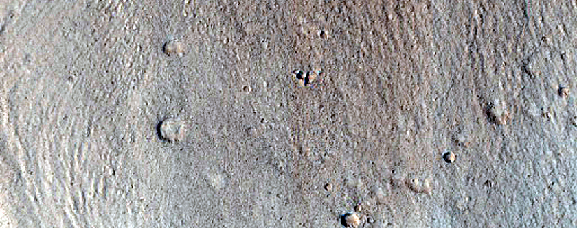 North-Pole-Facing Deposit in Crater Associated with Headwall Erosion