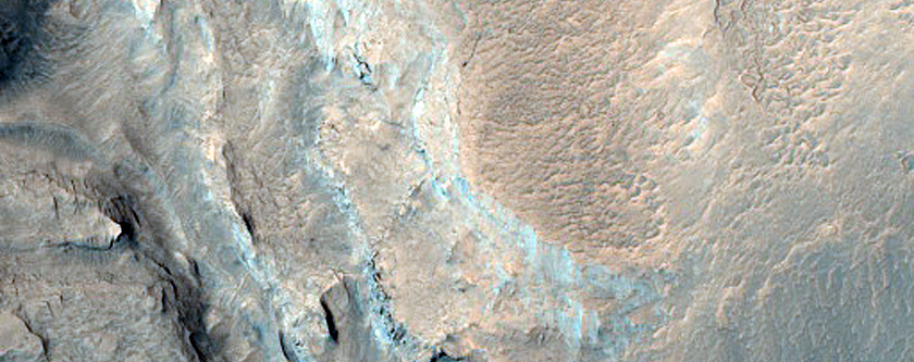 Fracturing Degraded Crater Deposit in Northern Arabia Terra