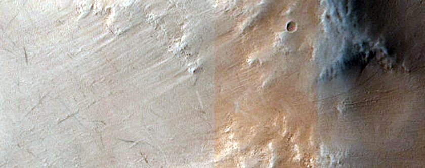 Possible Pyroxene Exposures on Arabia Terra Crater Wall