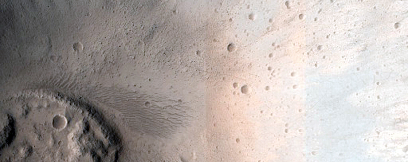 North-Pole-Facing Deposit in Crater Associated with Headwall Erosion