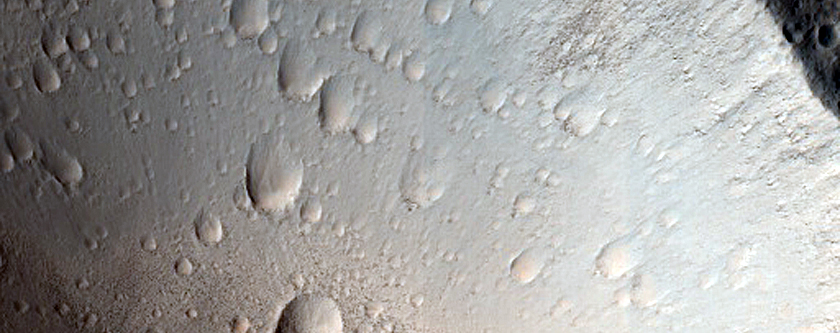 North-Pole-Facing Deposit in Crater Associated with Headwall Erosion