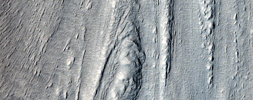 Tongue-Shaped Feature on Slope Seen in MOC Images R04-02106 and R12-01135