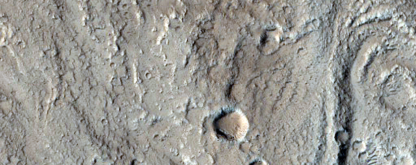 North-Pole-Facing Deposit in Crater Associated with Headwall Erosion