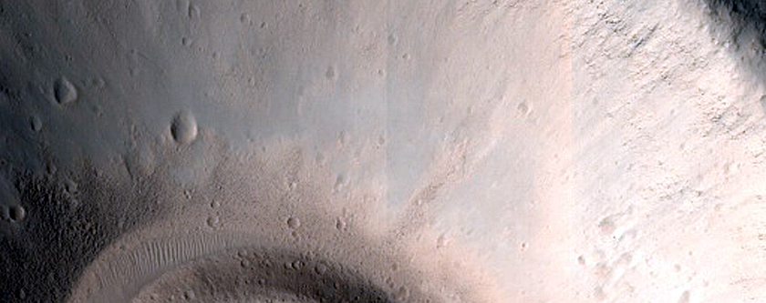 North-Pole-Facing Deposit in Crater Associated with Headwall Erosion