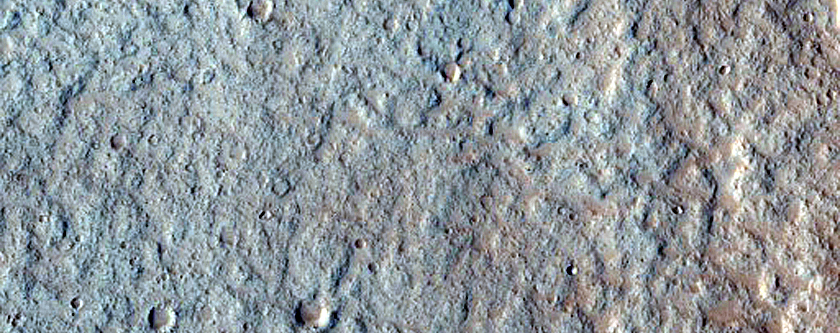 North-Pole-Facing Deposit in Crater Associated with Headwall Erosion