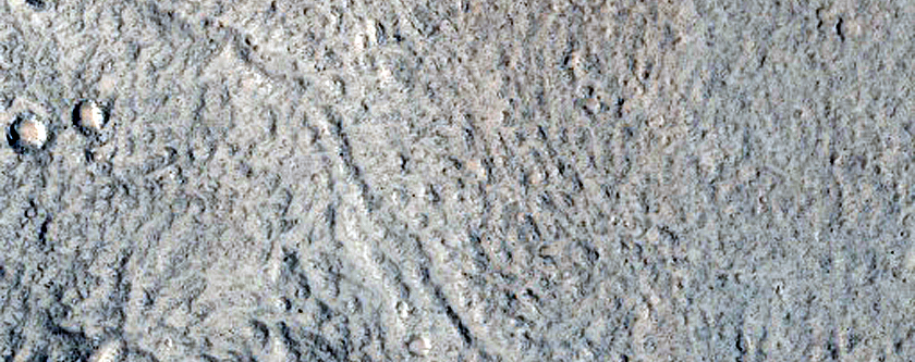 North-Pole-Facing Deposit in Crater Associated with Headwall Erosion