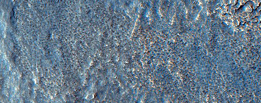 Pitted Surface near Ejecta in Deuteronilus Mensae
