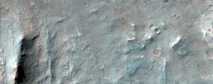 Possible Exposed Bedrock on Floor of 25-Kilometer Crater in Noachis Terra
