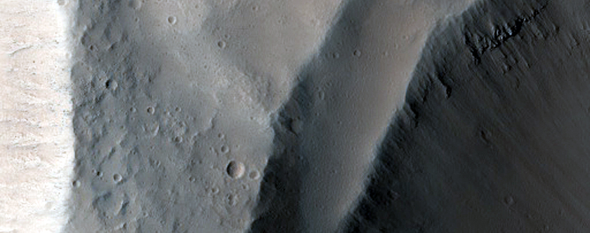 North-Pole-Facing Deposit in Crater Associated with Headwall Erosion