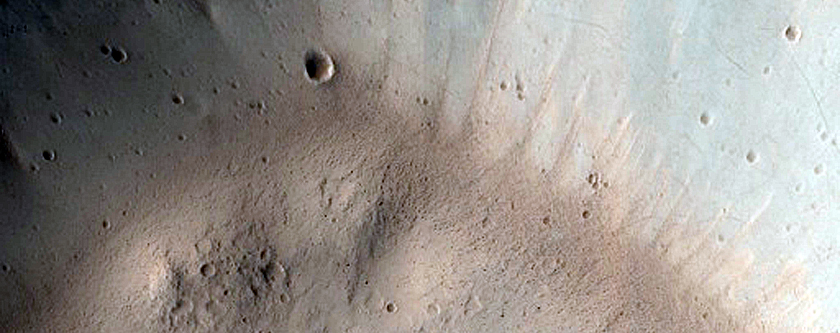 North-Pole-Facing Deposit in Crater Associated with Headwall Erosion