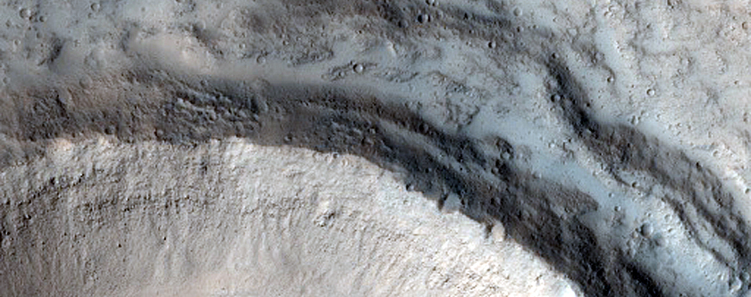 North-Pole-Facing Deposit in Crater Associated with Headwall Erosion