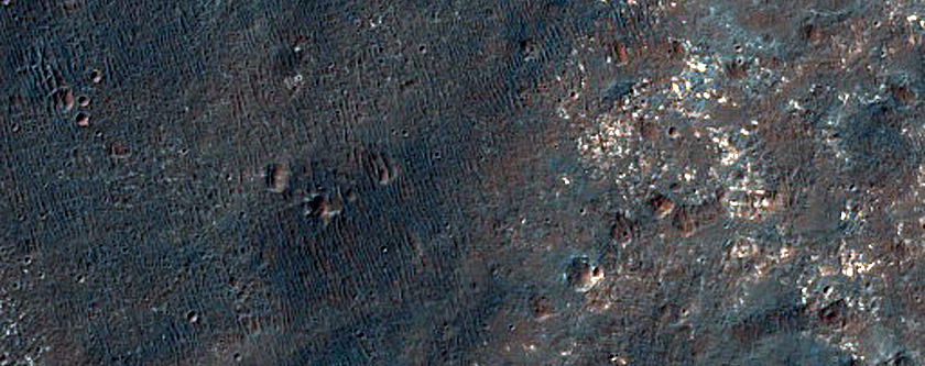 Iron-Rich Mineral Exposures South of Coprates Chasma