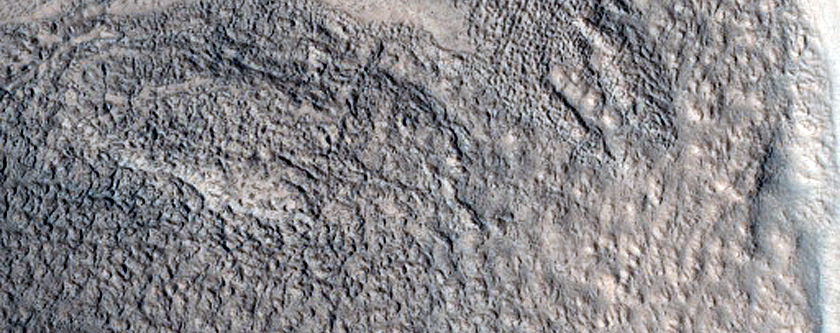 North-Pole-Facing Deposit in Crater Associated with Headwall Erosion