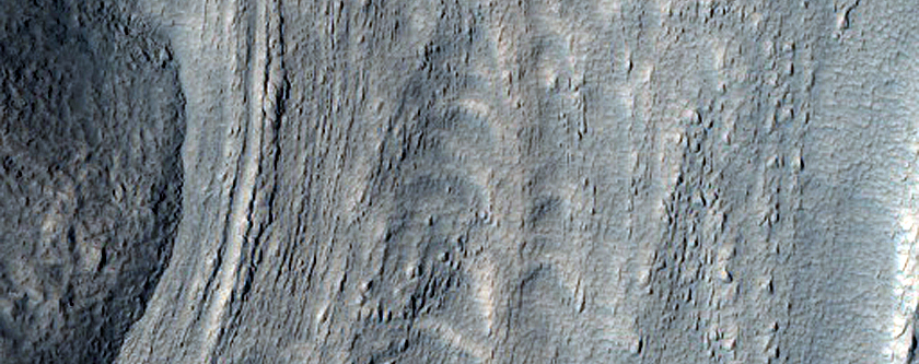 Tongue-Shaped Feature on Slope Seen in MOC Images R04-02106 and R12-01135
