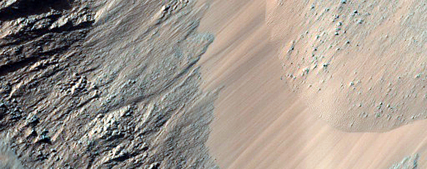 Potential Topographic Slumps in Western Eos Chasma