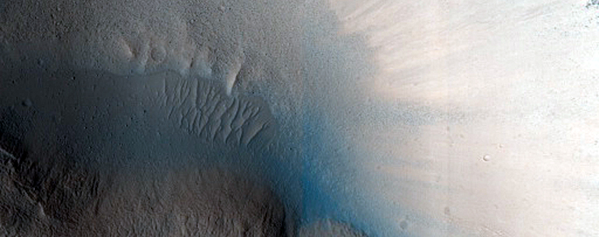 North-Pole-Facing Deposit in Crater Associated with Headwall Erosion