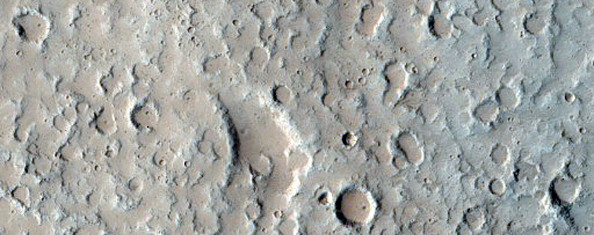 North-Pole-Facing Deposit in Crater Associated with Headwall Erosion
