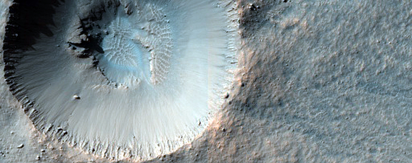 Fresh 1-Kilometer Impact Crater