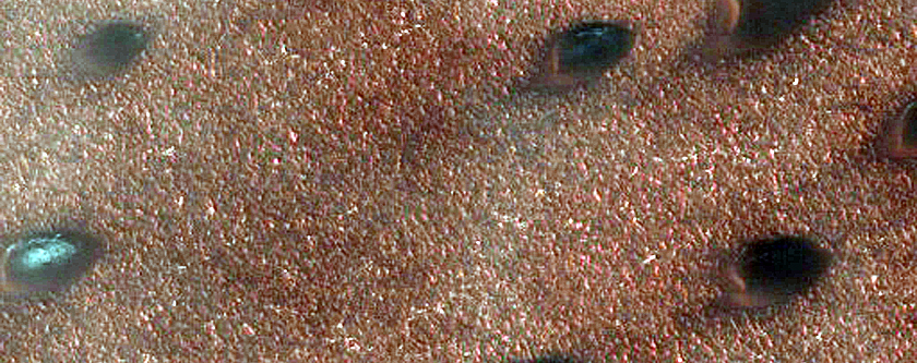 Dune Interaction with Residual Polar Ice West of Olympia Undae
