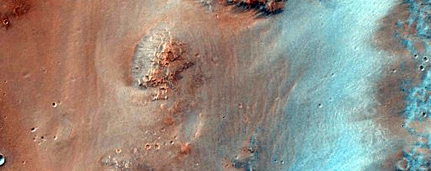 Mafic Minerals in Crater Ejecta near Syrtis Major Summit