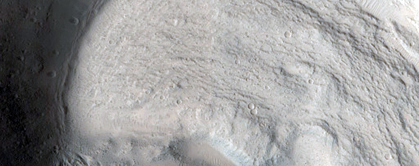 North-Pole-Facing Deposit in Crater Associated with Headwall Erosion
